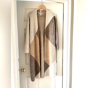 Full length sweater cardigan.  Color block in earth tones.  Never worn.  Size S.